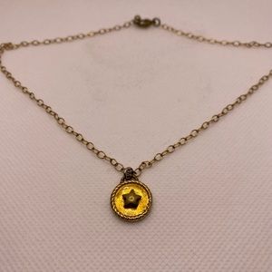 Star charm necklace.